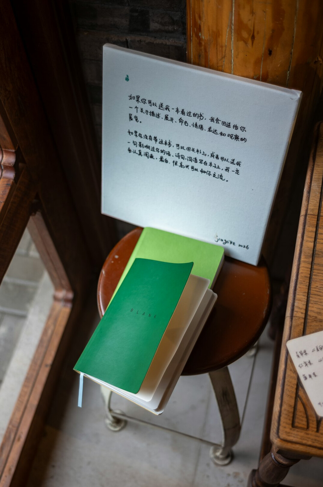 Open books and handwritten notes on a table